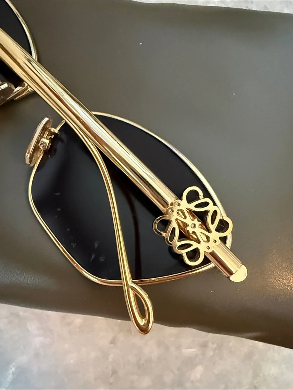 Loewe Gold Frame Sunglasses with Dark Lenses